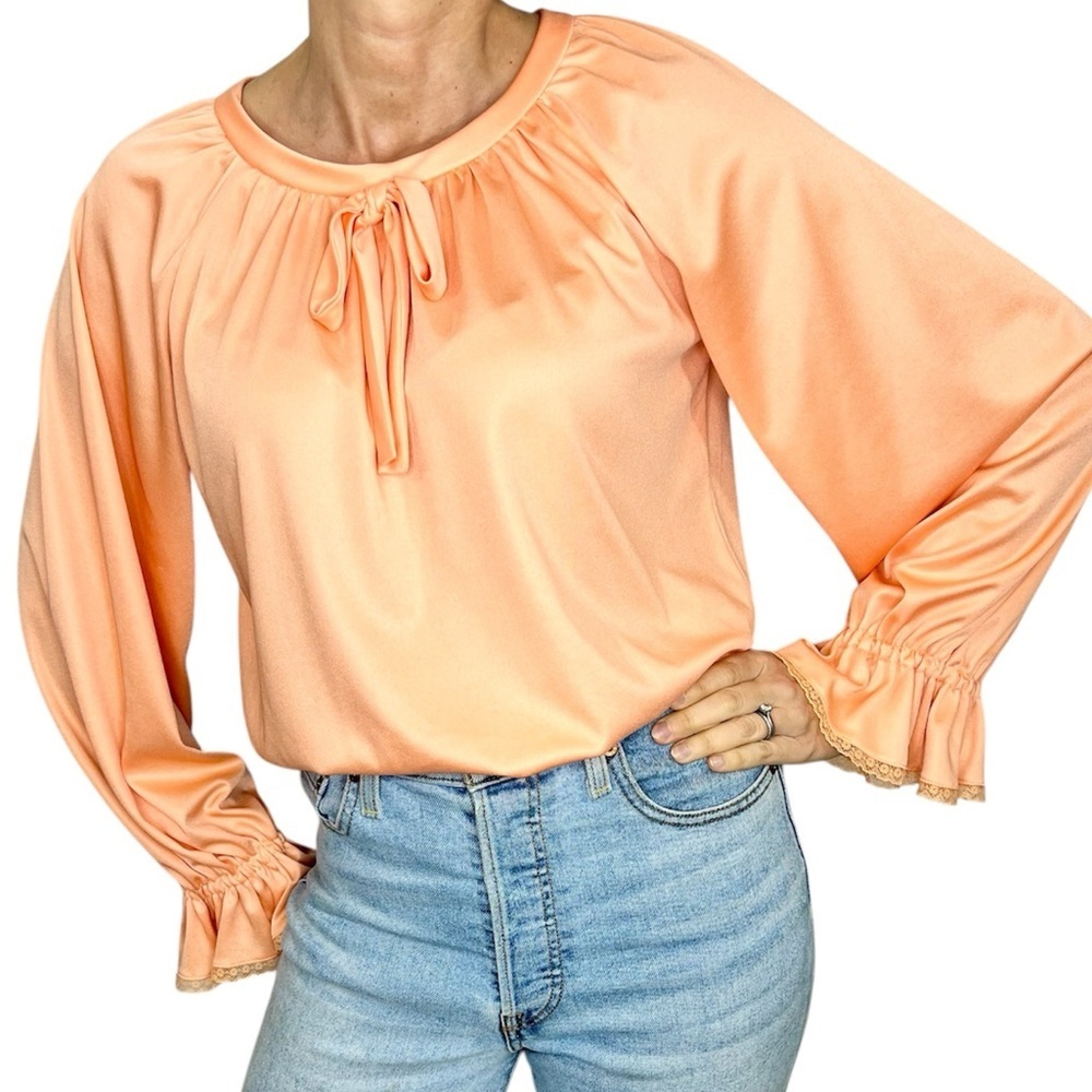 Vintage 70s peachy orange lace trim bell cuff long sleeve tie neck blouse